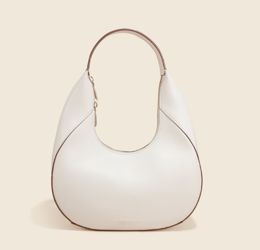 Crescent shaped shoulder bag made of cowhide