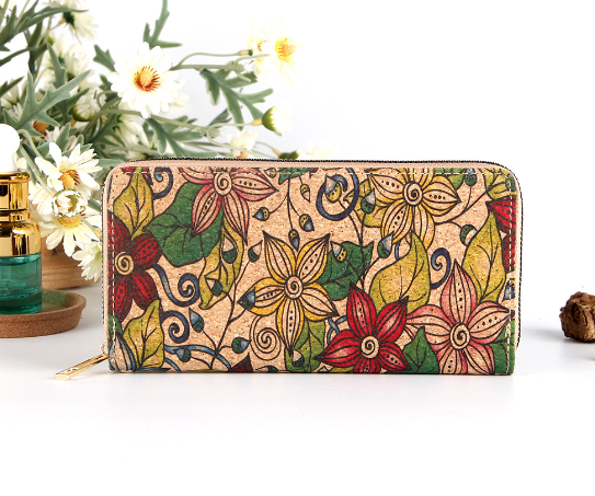 long multi functional wallet with a zippered ethnic print pattern